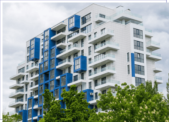 A building with blue windows and white balconies.